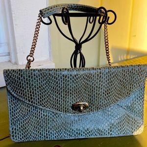 Sorial clutch/wristlet